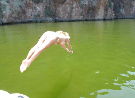 Hot american wife Sandra Otterson exposes big tits and sexy butt outside